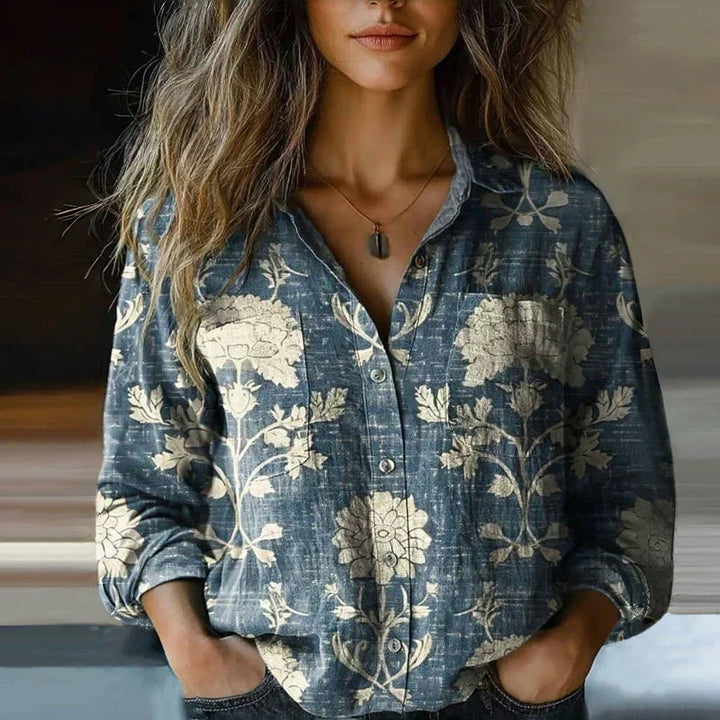 Comfortable women's button-down blouse with intricate paisley bandana print. Long sleeve boho top, vintage style.