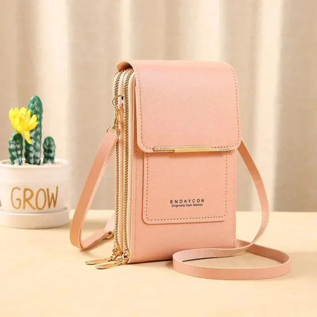 Everyday women's touchscreen phone crossbody bag, keeps essentials organized & accessible.
