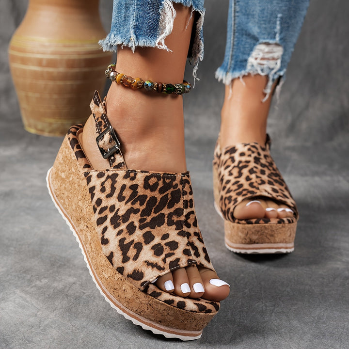 Front view of women's platform sandals, showcasing stylish design, adjustable straps, & quality material.