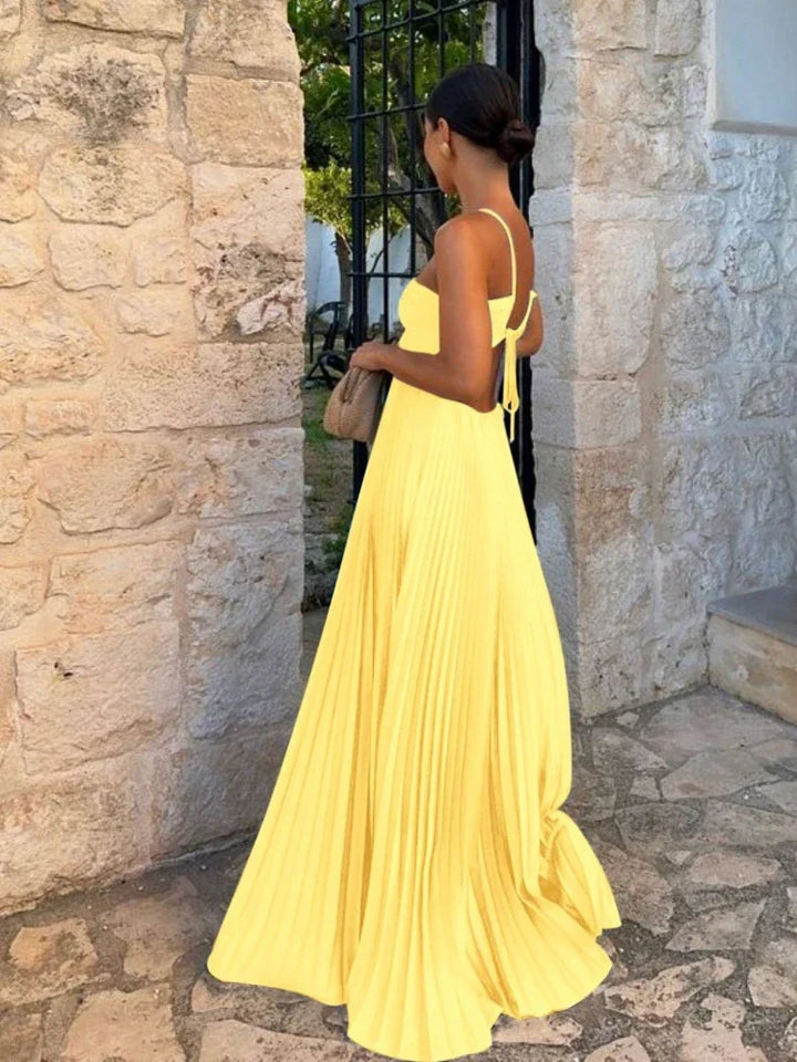 Women's elegant sleeveless pleated maxi dress, a perfect choice for wedding guests, formal events, and evening wear.