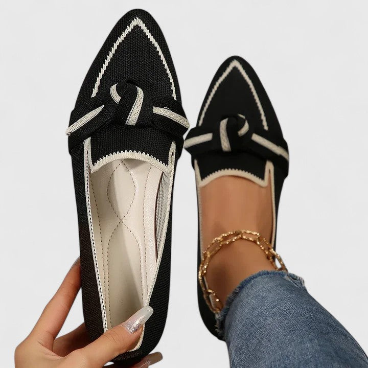 Comfortable slip-on women's pointed-toe flat loafers with a chic knot-front design for versatile styling.
