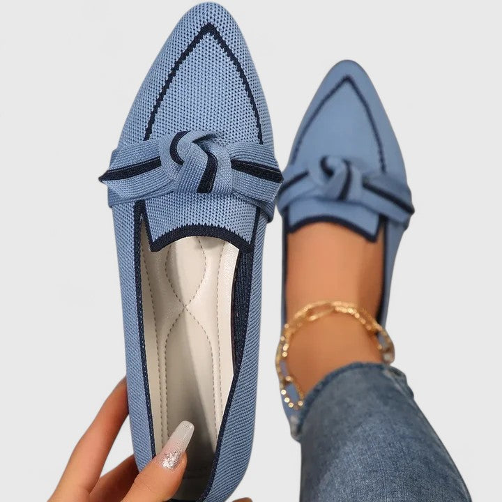 Women's pointed toe slip-on loafers with stylish contrast trim. Perfect elegant flats for office or casual chic.