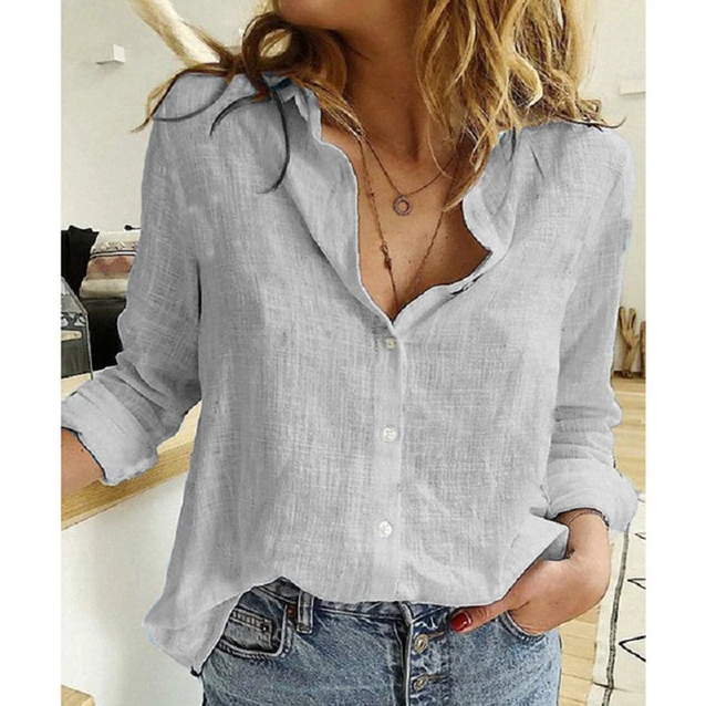 Effortless women's relaxed fit blouse. Comfortable long sleeve button-down top for everyday style.