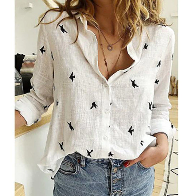 Elegant women's relaxed fit blouse. Effortless long sleeve button-down top for various occasions.