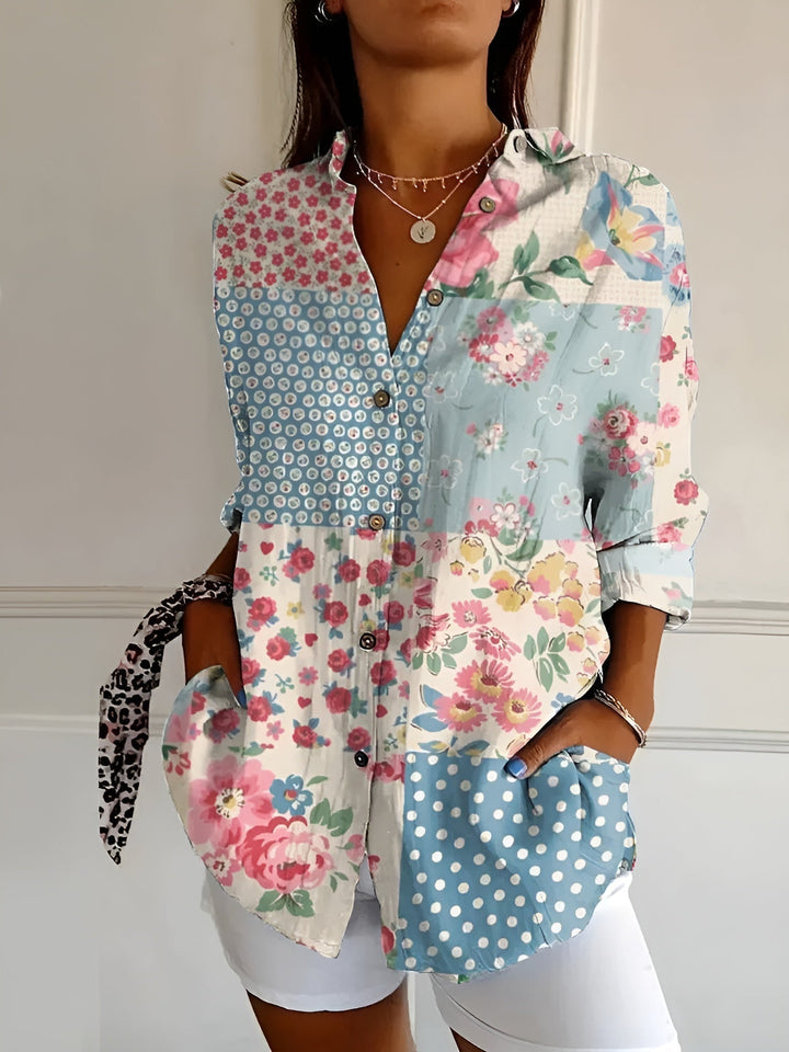 Stylish women's relaxed fit button-down blouse, a versatile long-sleeve top for casual or office wear.