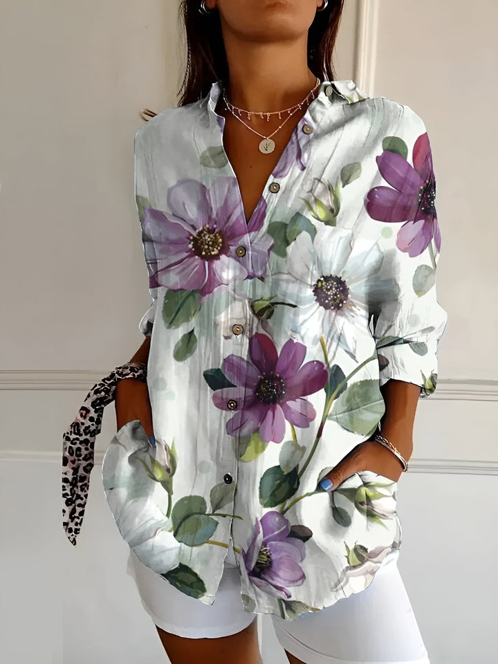Comfortable & stylish relaxed fit women's long-sleeve button-down blouse, great for everyday fashion.
