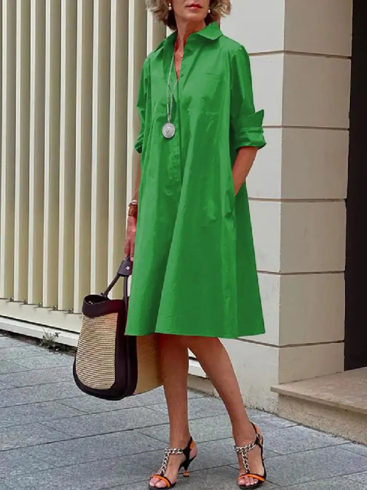 Elegant red women's relaxed fit midi shirt dress with button-front, perfect for office or a casual outing.