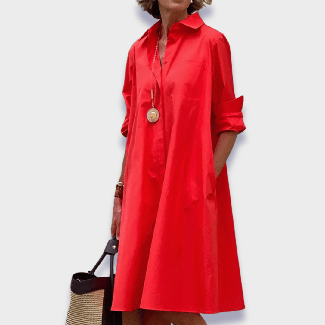 Women's relaxed fit button-up midi shirt dress with pockets, perfect for casual summer wear and everyday elegance.