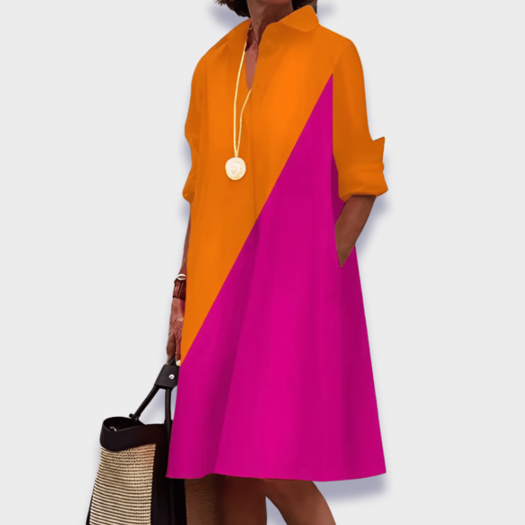 Chic women's midi shirt dress with a relaxed button-up design & functional pockets, ideal for summer & everyday casual.