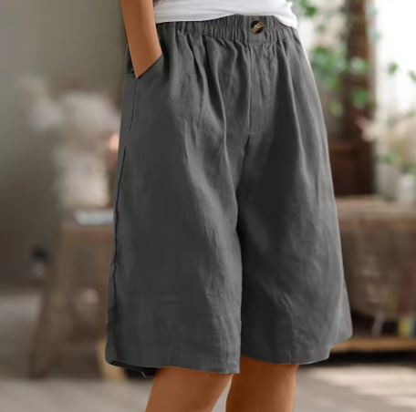 Casual mid-thigh women's shorts, featuring a comfortable elastic waist for warm weather style.