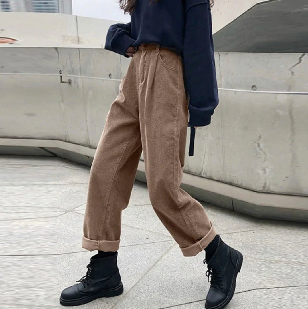 Relaxed fit women's trousers offering a comfortable and modern silhouette.