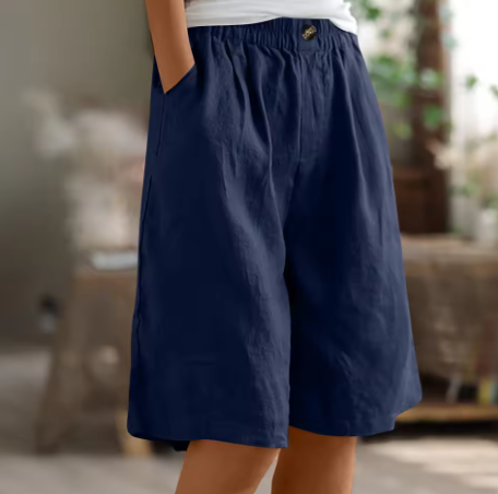 Practical women's high-waisted Bermuda shorts with elastic waist for ultimate comfort. Relaxed fit for summer casual wear.