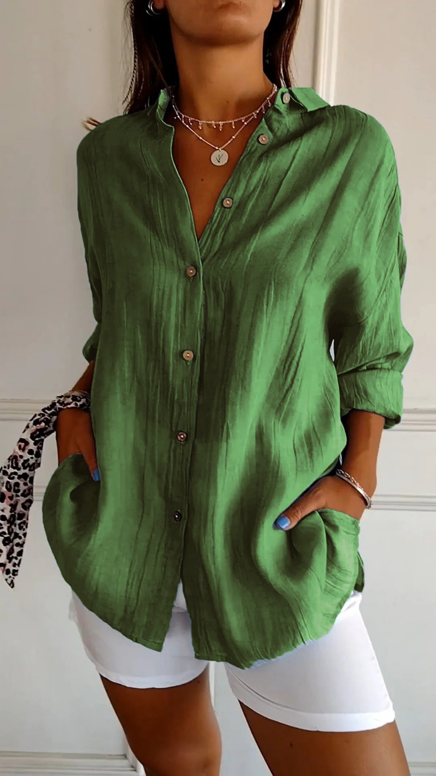 Trendy oversized long sleeve button-up shirt for women, a stylish relaxed fit casual blouse.
