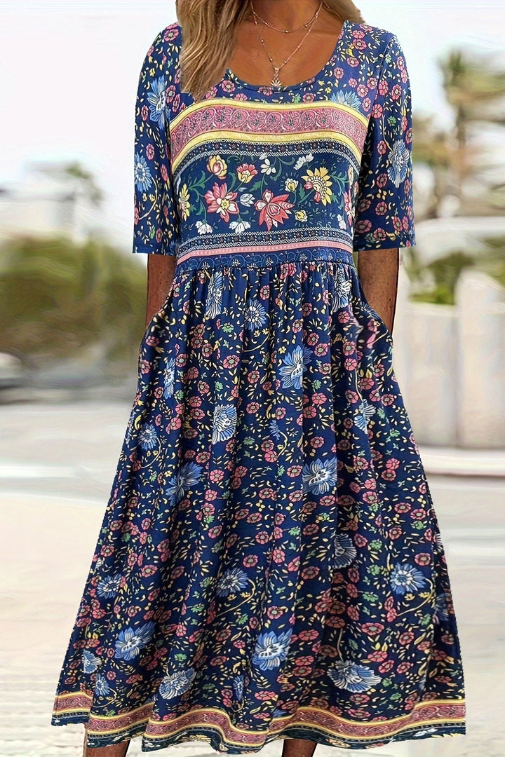 Comfortable women's midi dress showcasing a beautiful daisy print pattern and a relaxed fit, perfect for warm weather.