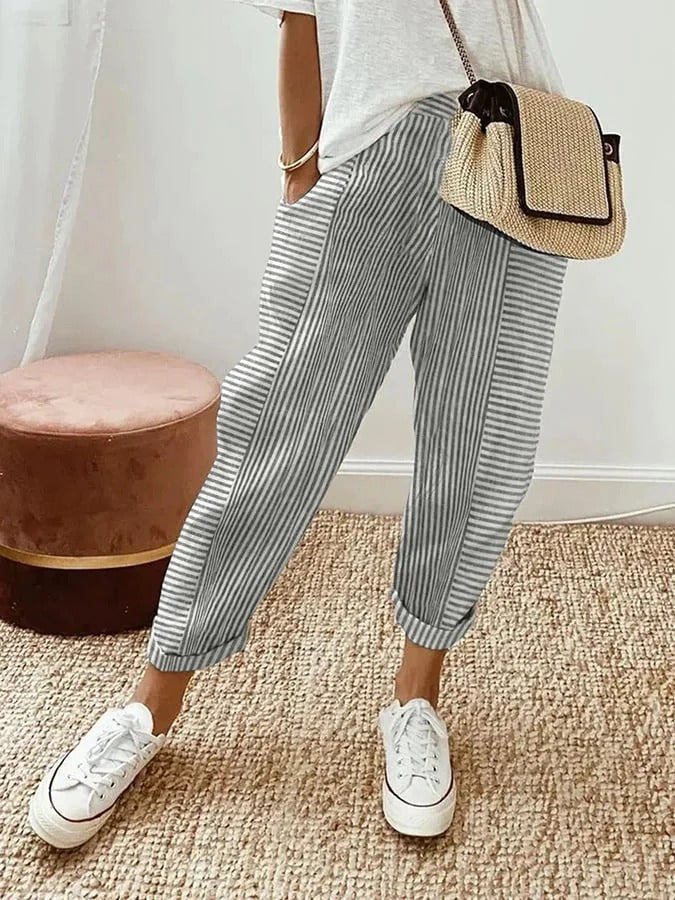 Stylish women's striped drawstring pants paired for a versatile casual outfit; relaxed fit everyday comfort.