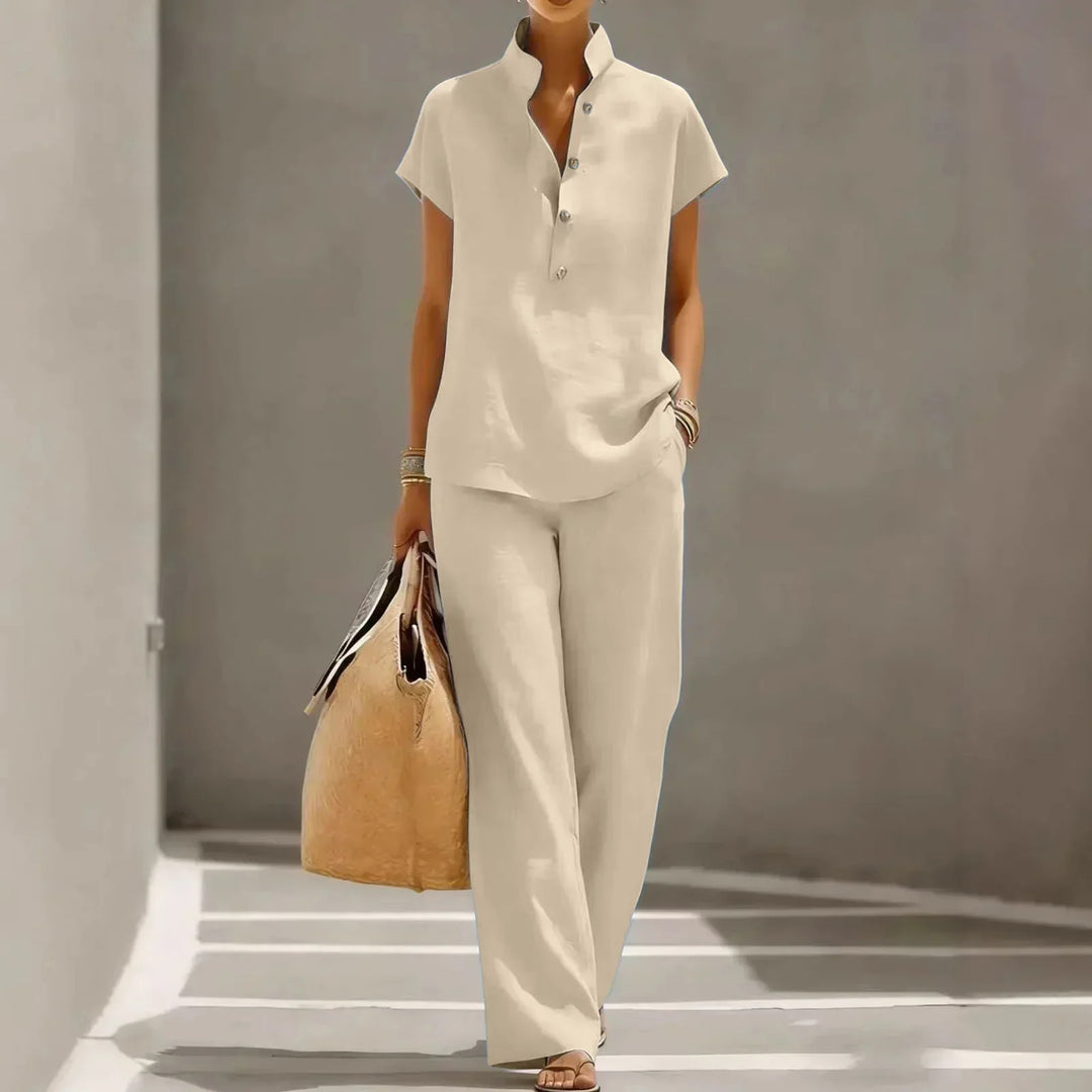 Women's stylish & comfortable two-piece summer clothing set with relaxed short-sleeve top & wide-leg pants.