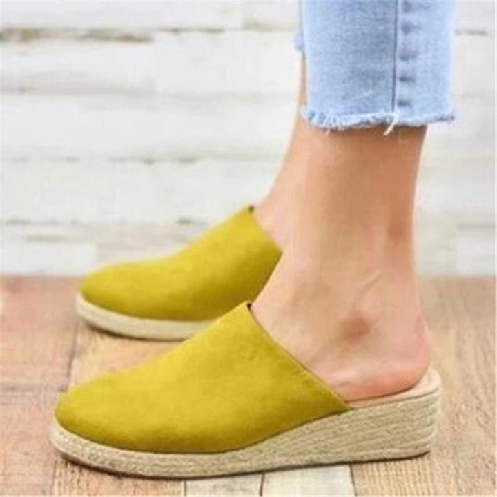 Versatile women's slip-on wedge sandals, ideal for summer fashion and ultimate comfort.