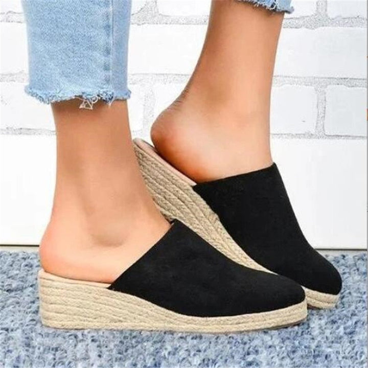Retro chic women's sandals, featuring a comfortable wedge platform for stylish summer looks.