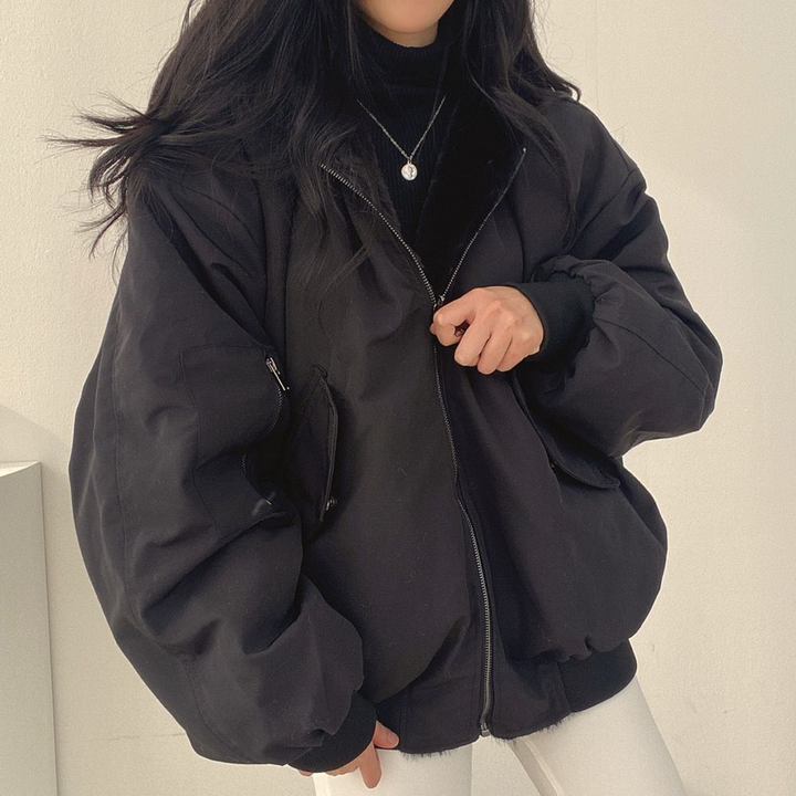 Full shot of women's reversible hooded jacket, showcasing comfortable fit, cozy feel, & versatile style.