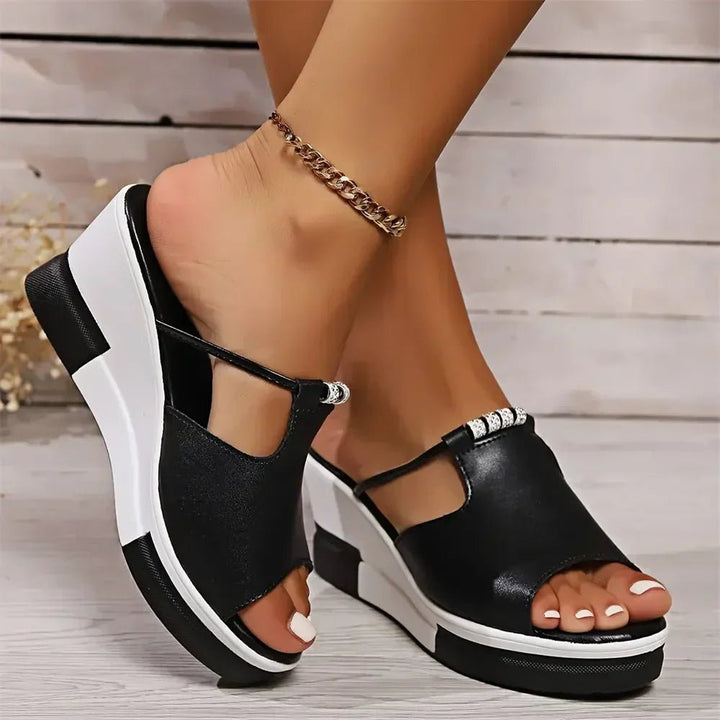 Casual women's slip-on rhinestone wedge sandals. Fashionable open-toe platform slides for effortless summer style.