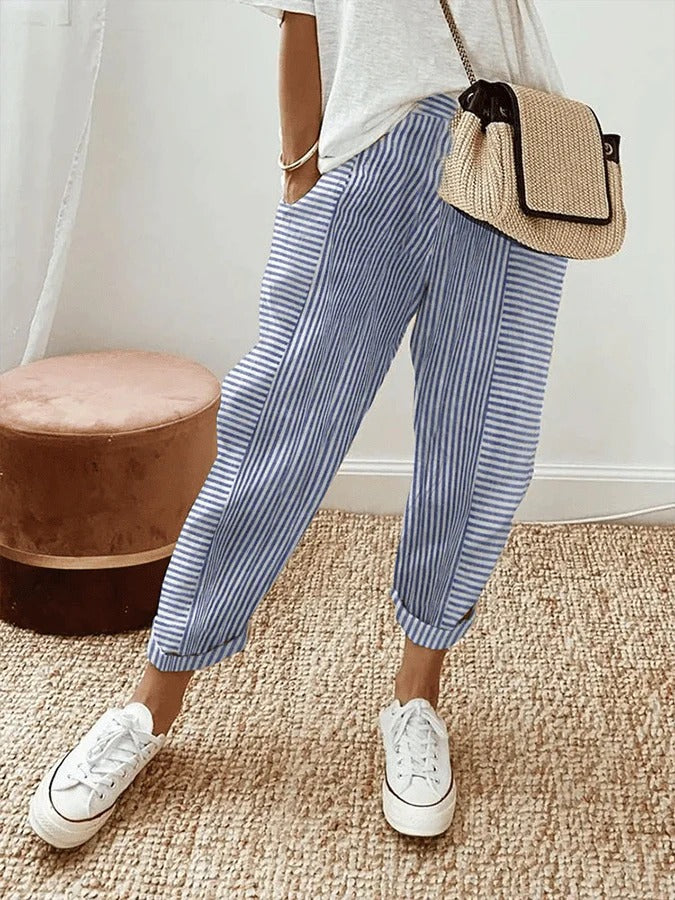 Stylish women's Roah striped trousers, versatile for work attire or weekend style, fashionably relaxed fit.