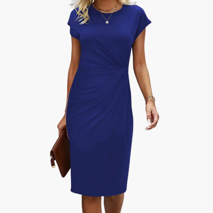 Elegant women's short sleeve midi dress, featuring a classic round neck. Perfect for versatile styling.