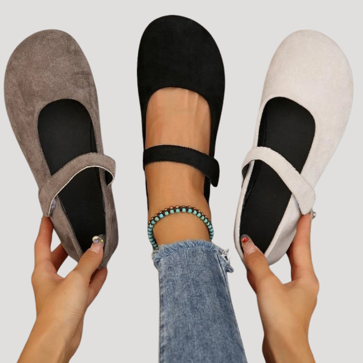 Versatile women's round toe Mary Jane flats. Cushioned, with a secure Velcro strap for casual everyday style.