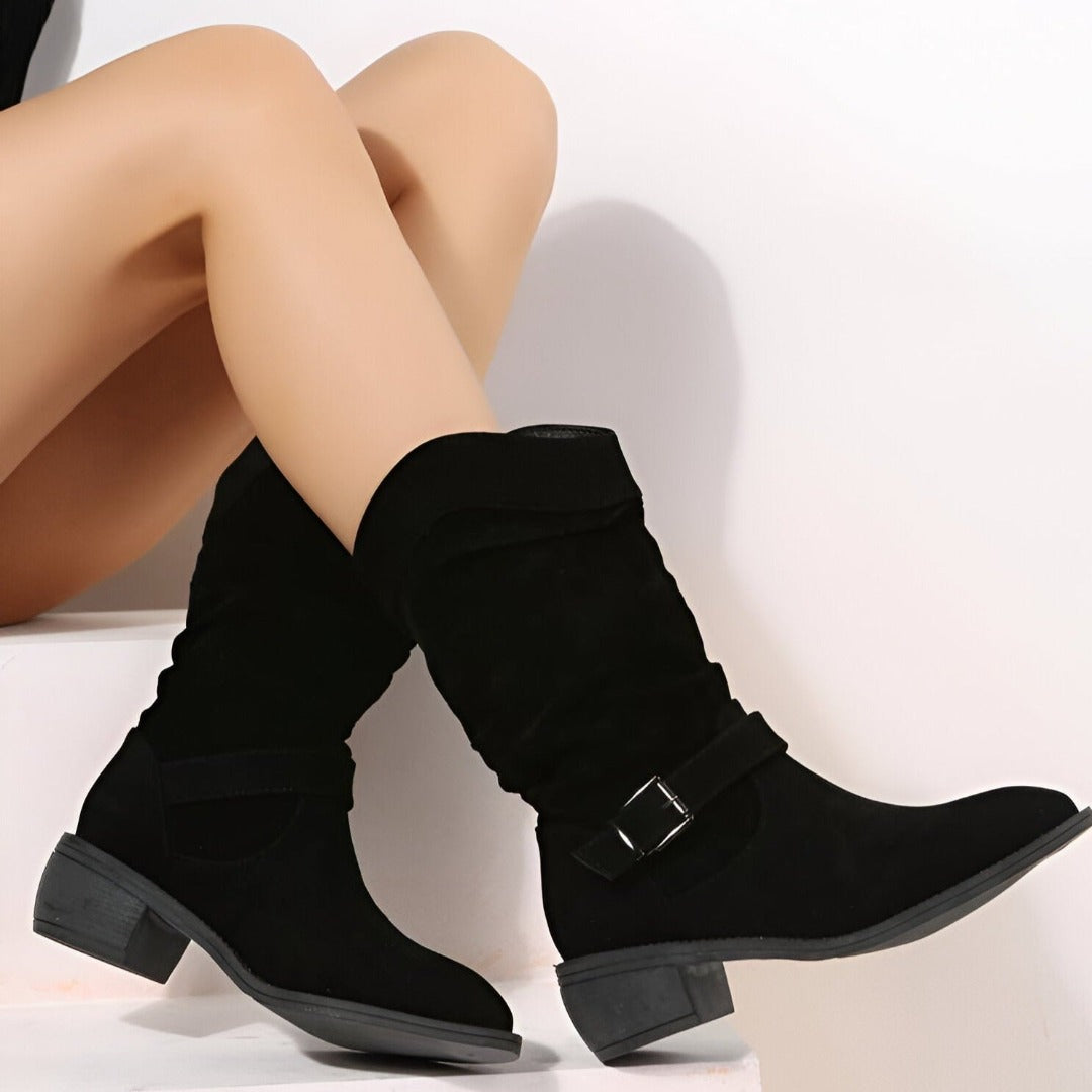 Stylish women's ankle boots with elegant ruching & side zip. Essential comfortable footwear for everyday winter outfits.
