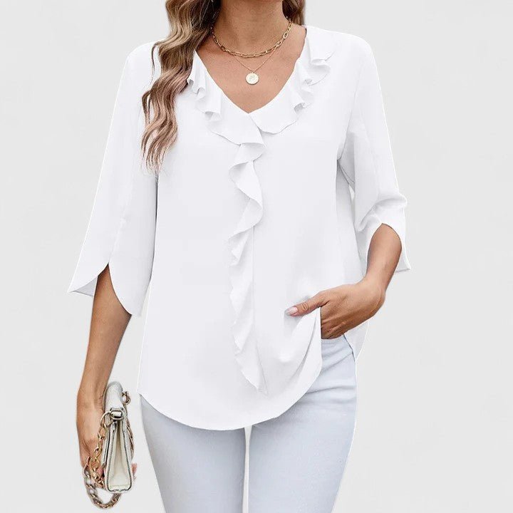 Versatile women's blouse: elegant V-neck, ruffle details & split sleeves for relaxed fit.