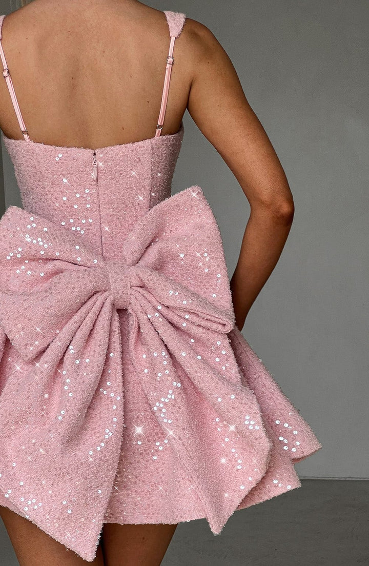 Dazzling women's sequin fit & flare mini dress, sleeveless, ideal for evening events, with a chic back bow.