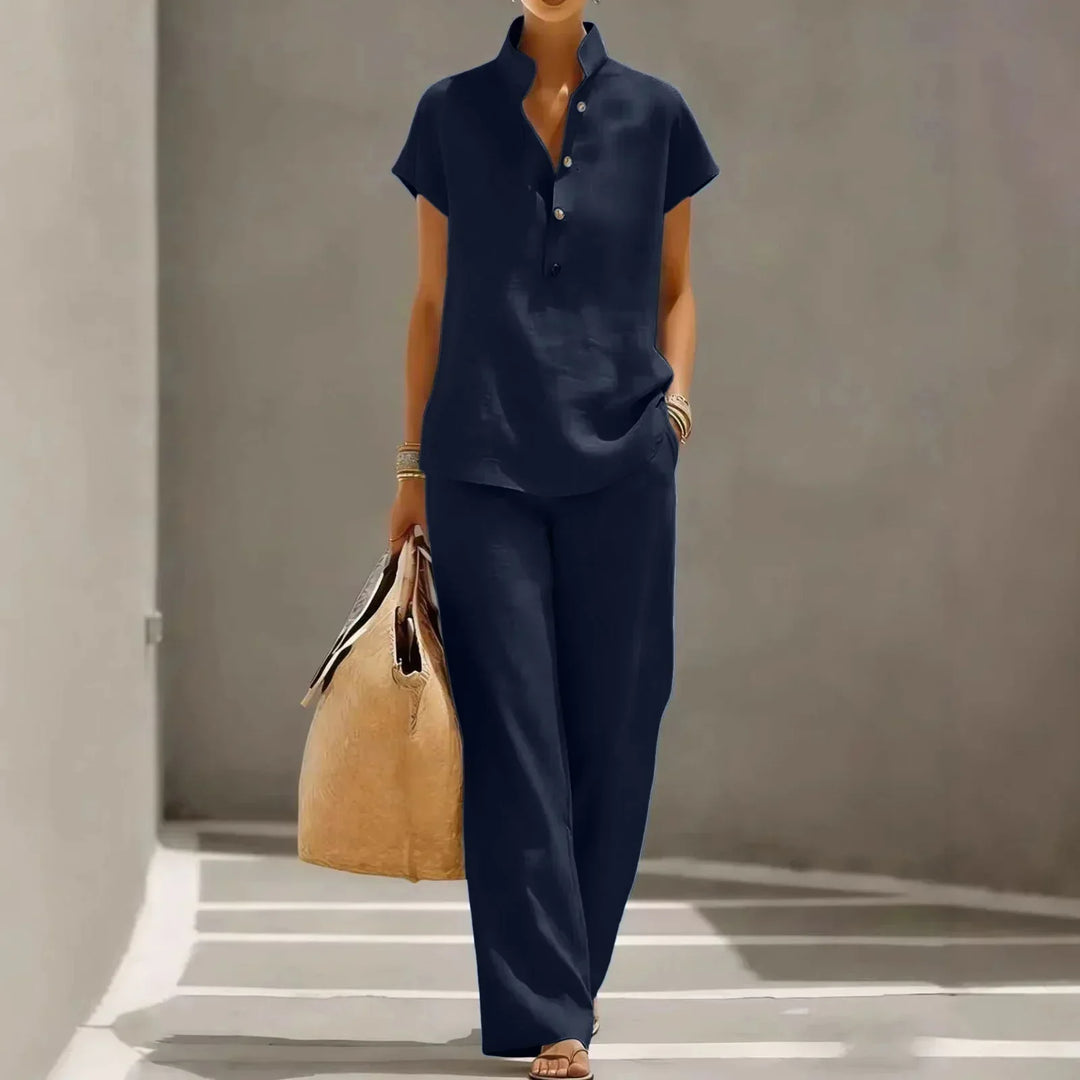 Casual women's two-piece matching lounge set with a short sleeve top & wide leg pants for ultimate comfort.