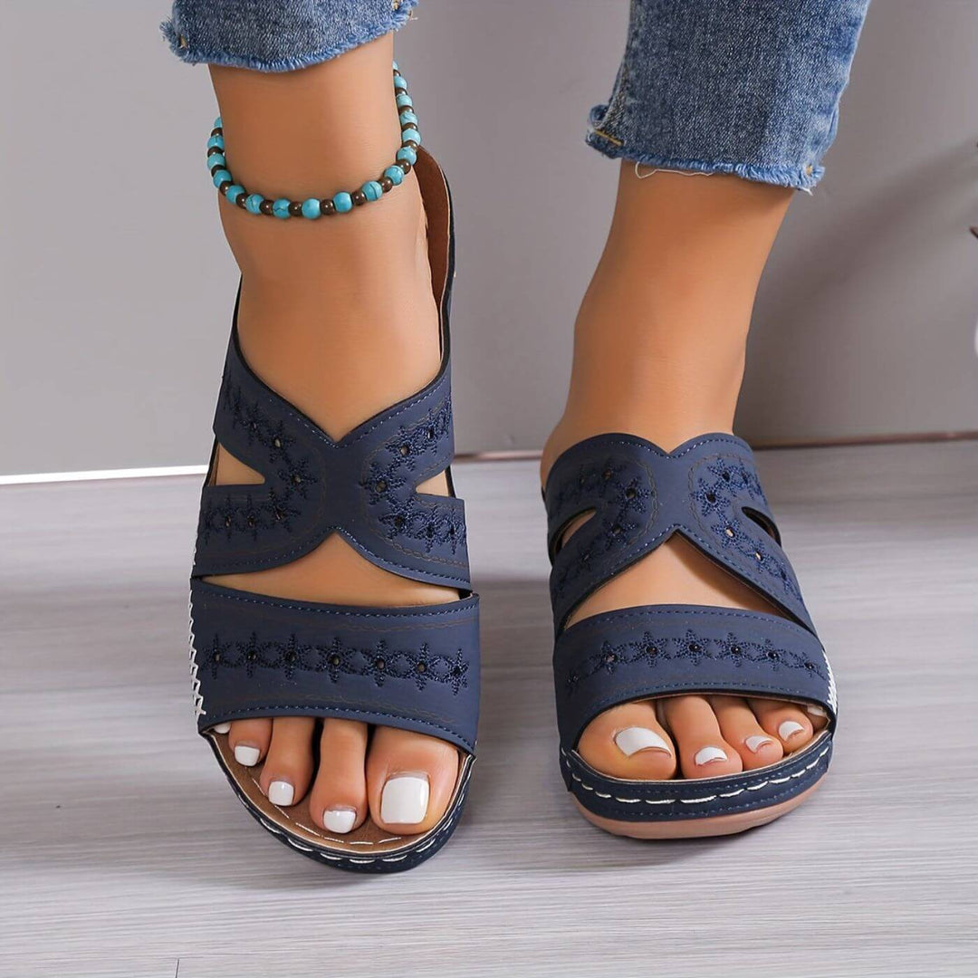 Durable women's walking sandals, slip-resistant with orthopedic arch support for active comfort.