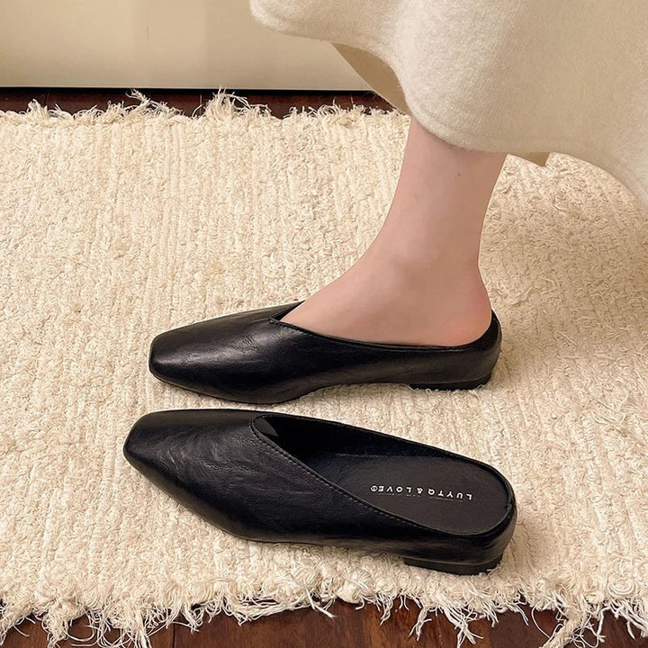 Chic women's square toe flats with a practical slip-on design, blending comfort and contemporary style.