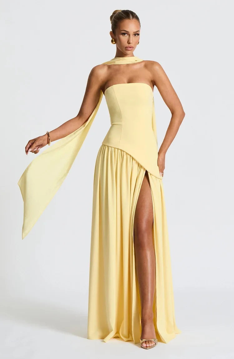 Elegant strapless summer maxi dress, flowing silhouette and asymmetric detailing.