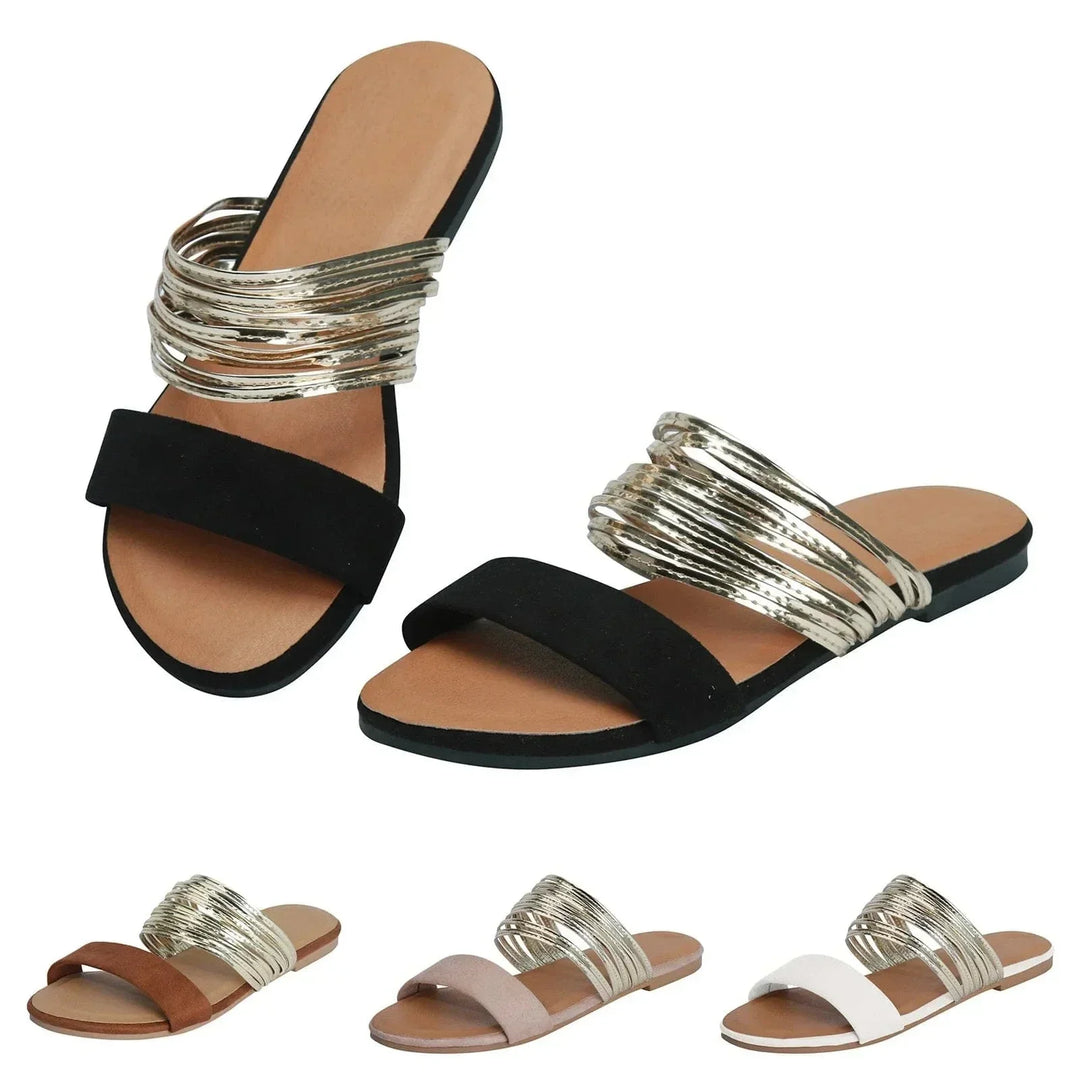 Chic women's open-toe flat sandals, strappy slip-on design for comfortable summer vacation, beach, & casual wear.
