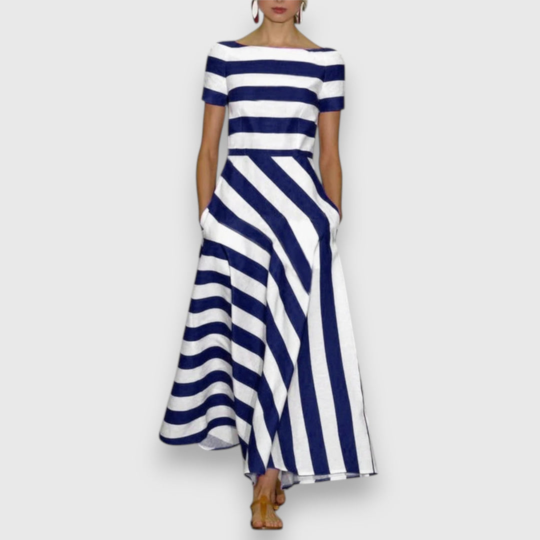 Women's striped boat neck A-line midi dress with pockets, perfect for casual spring or summer elegance.