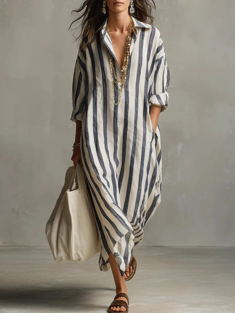 Women's striped maxi shirt dress with practical pockets, ideal for a relaxed summer or travel look.
