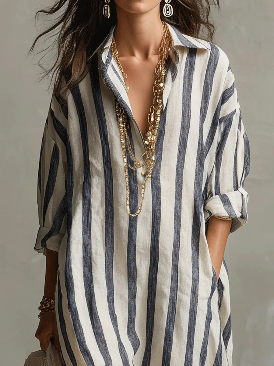 Elegant women's striped long maxi shirt dress with a flattering V-neck and convenient side pockets.