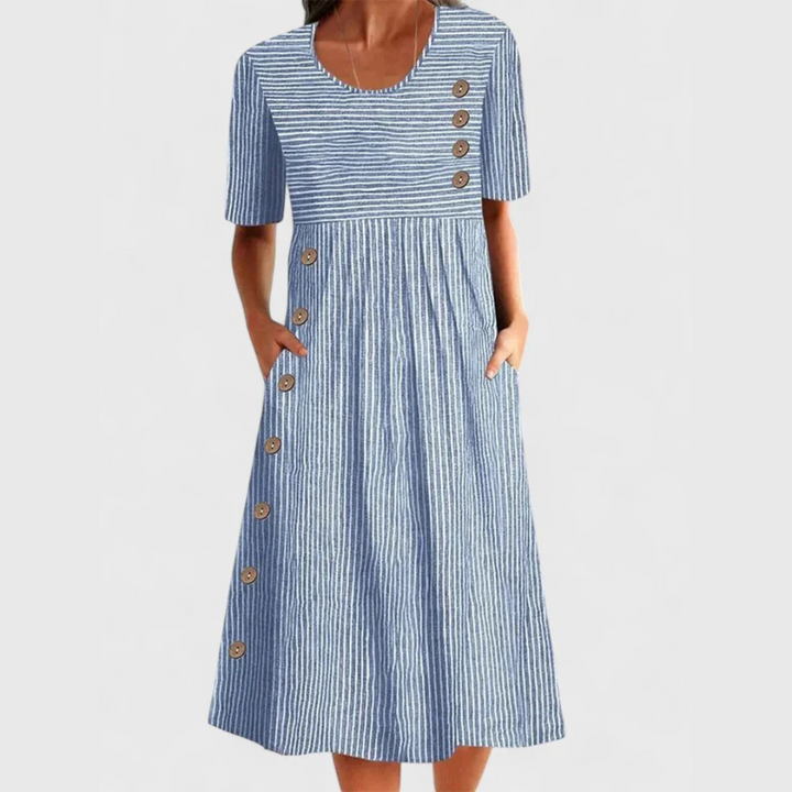Women's striped midi dress with button detail. Perfect for casual summer wear, comfortable & versatile.