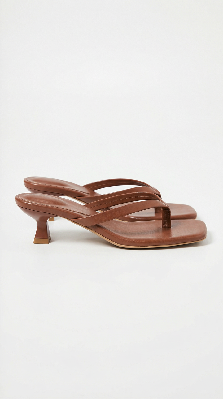 Stylish women's summer sandals featuring a comfortable thong and kitten heel.