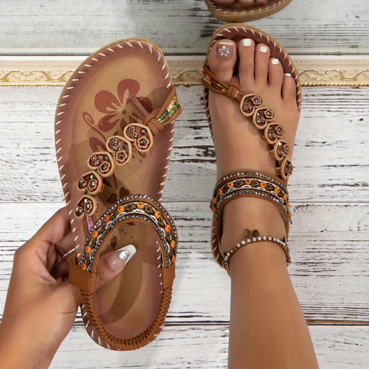 Women's stylish & comfortable flat sandals for everyday wear.