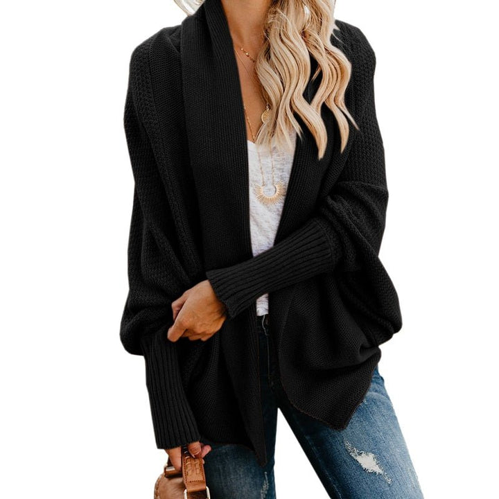 Elegant oversized cardigan for women, offering warmth and a trendy fashion statement.