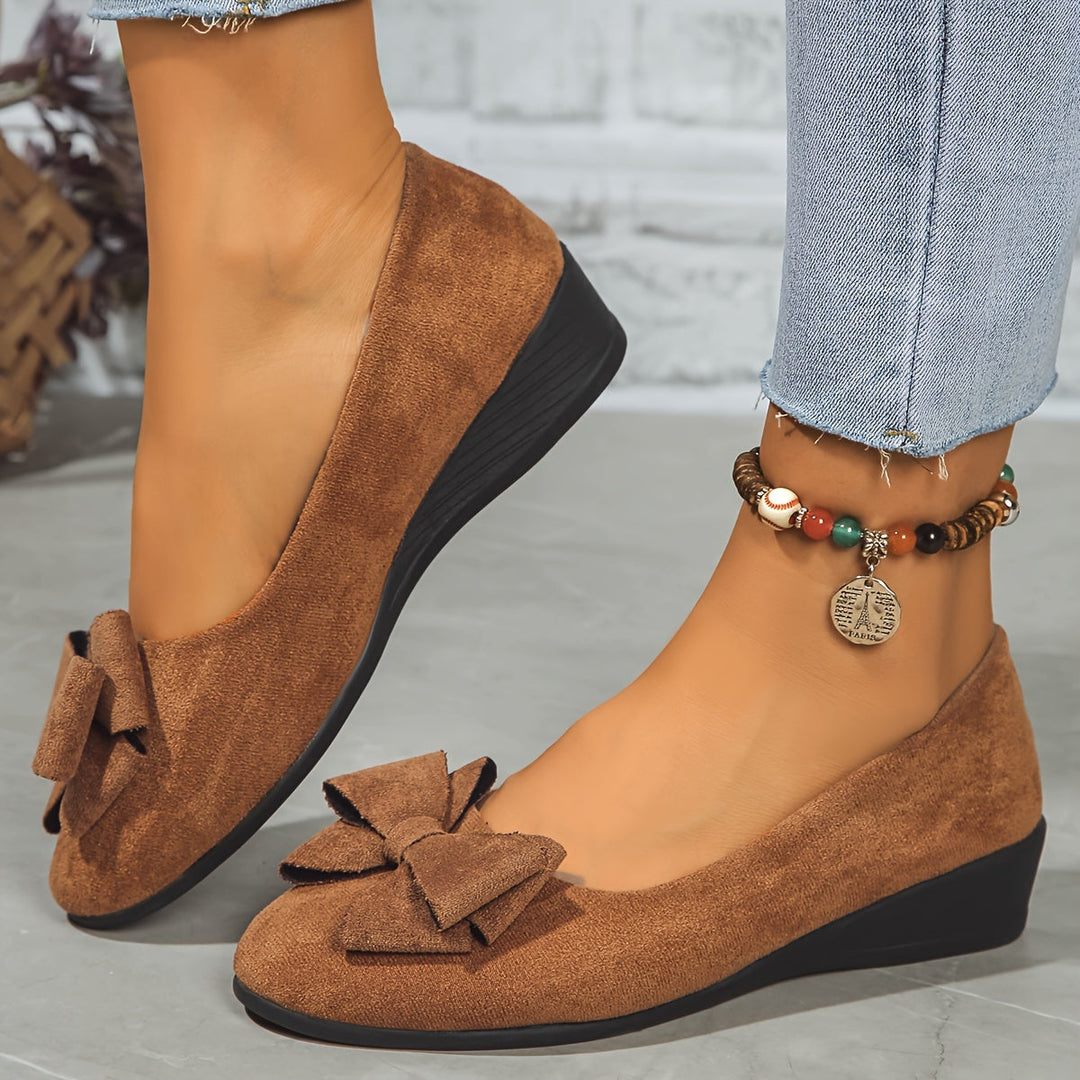 Effortless comfort in women's stylish slip-on wedge shoes; perfect for versatile fashion.