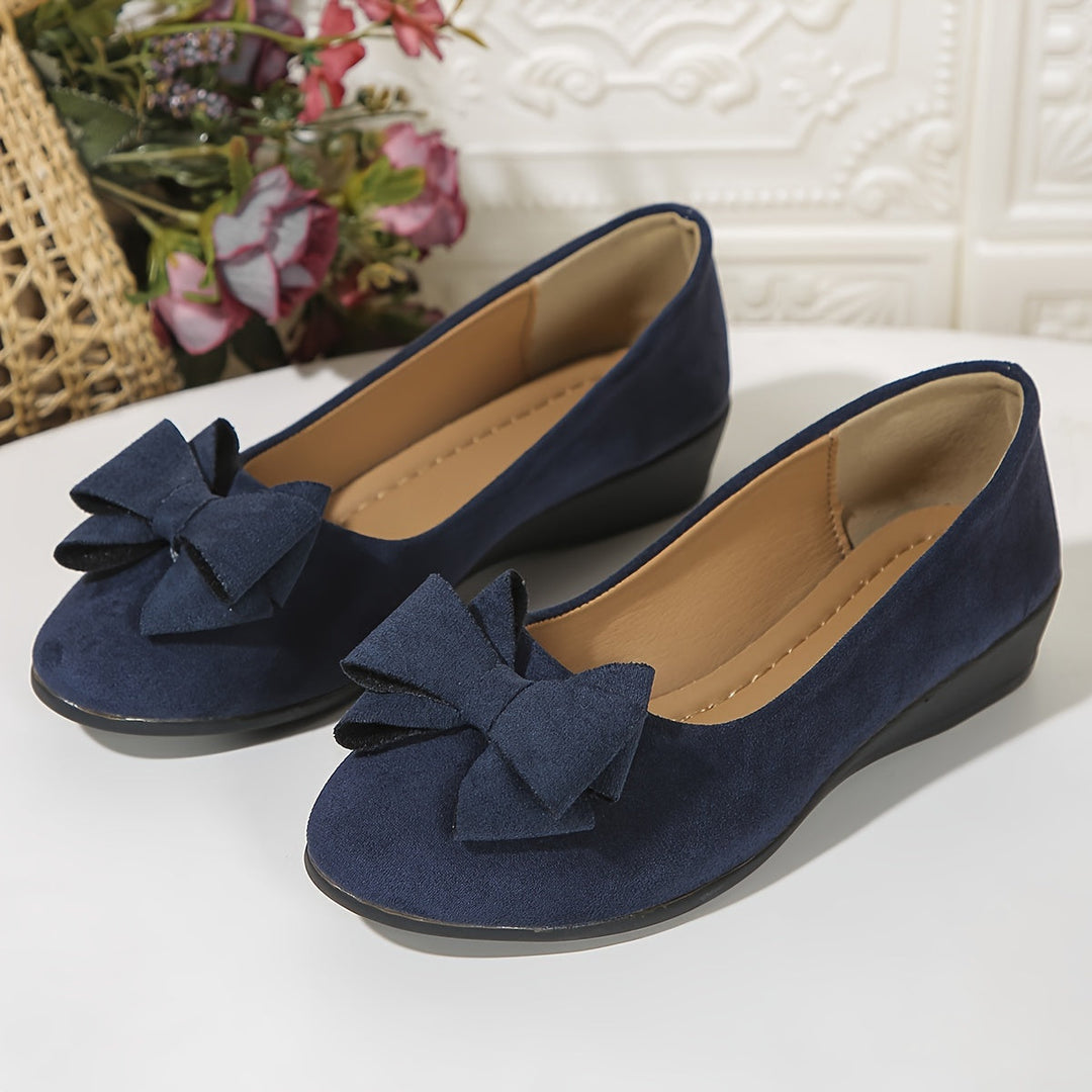 Chic women's dress wedge heels, elegant slip-on footwear for sophisticated style.