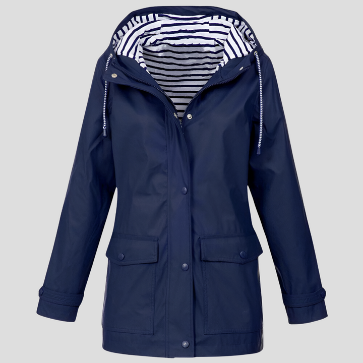 Women's hooded winter jacket with functional front pockets. Offers stylish outdoor protection & comfort.