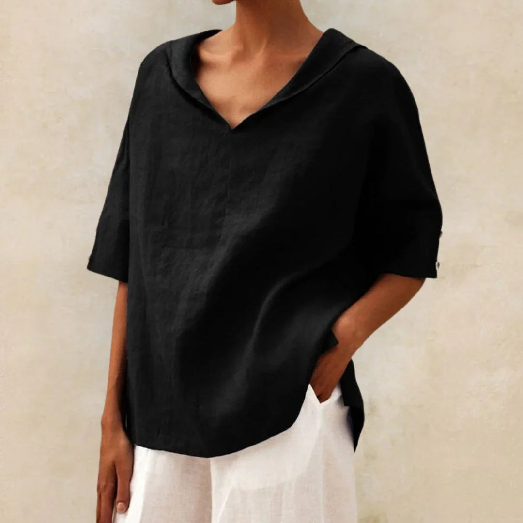 Versatile women's casual blouse, featuring a button-front design and stylish roll-up sleeves for summer comfort.