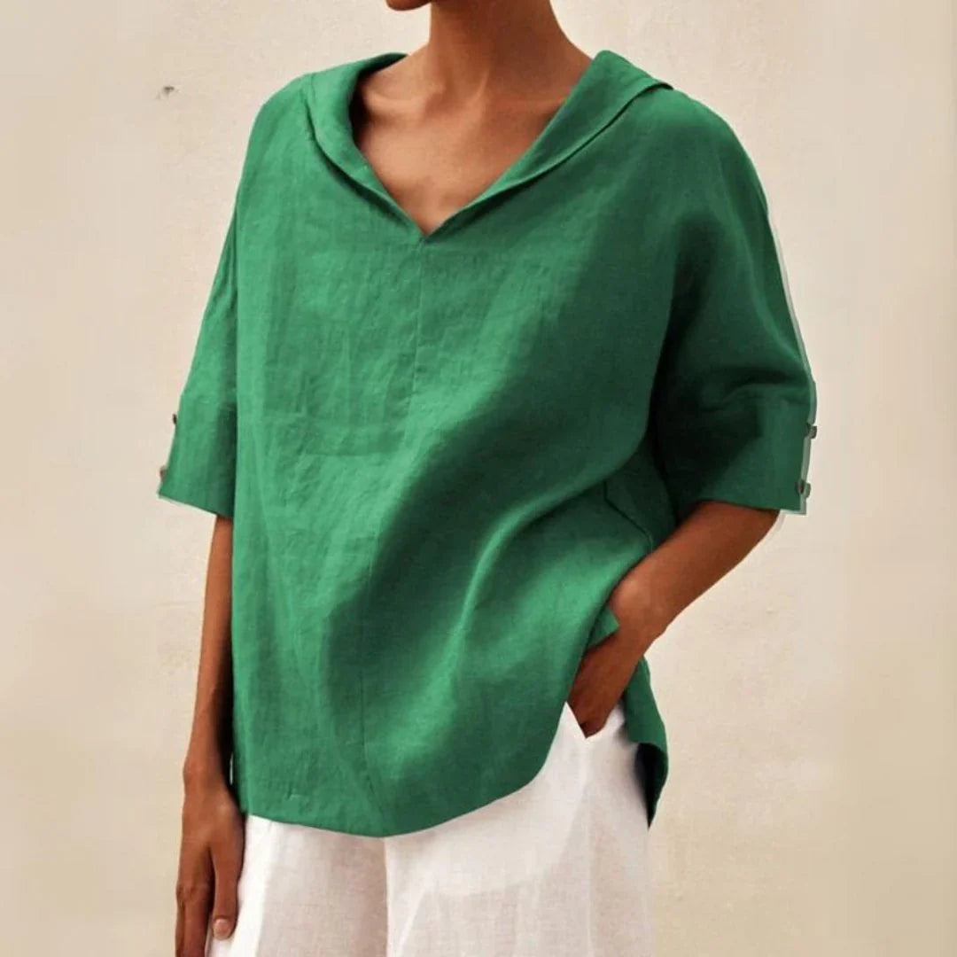 Lightweight women's spring/summer top. Button-front blouse with roll-up sleeves, great for casual versatile outfits.