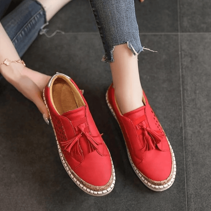 Stylish women's breathable slip-on footwear, perfect summer sneakers combining fashion & comfort.