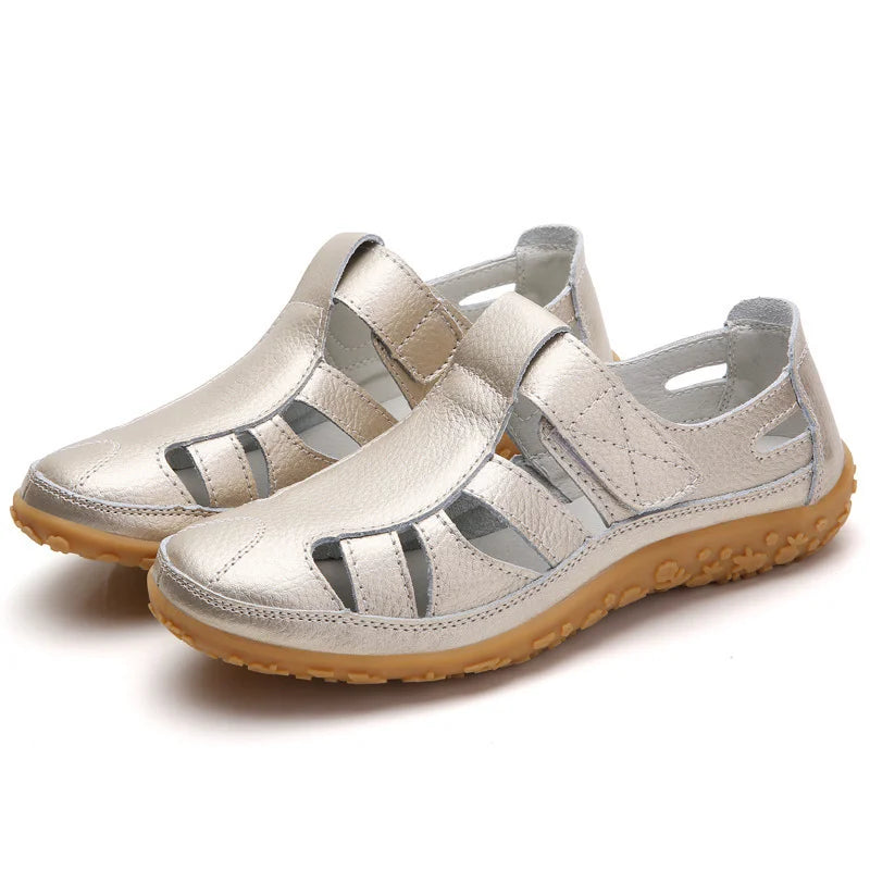 Side profile of supportive women's walking sandals, emphasizing the comfortable sole for balance.