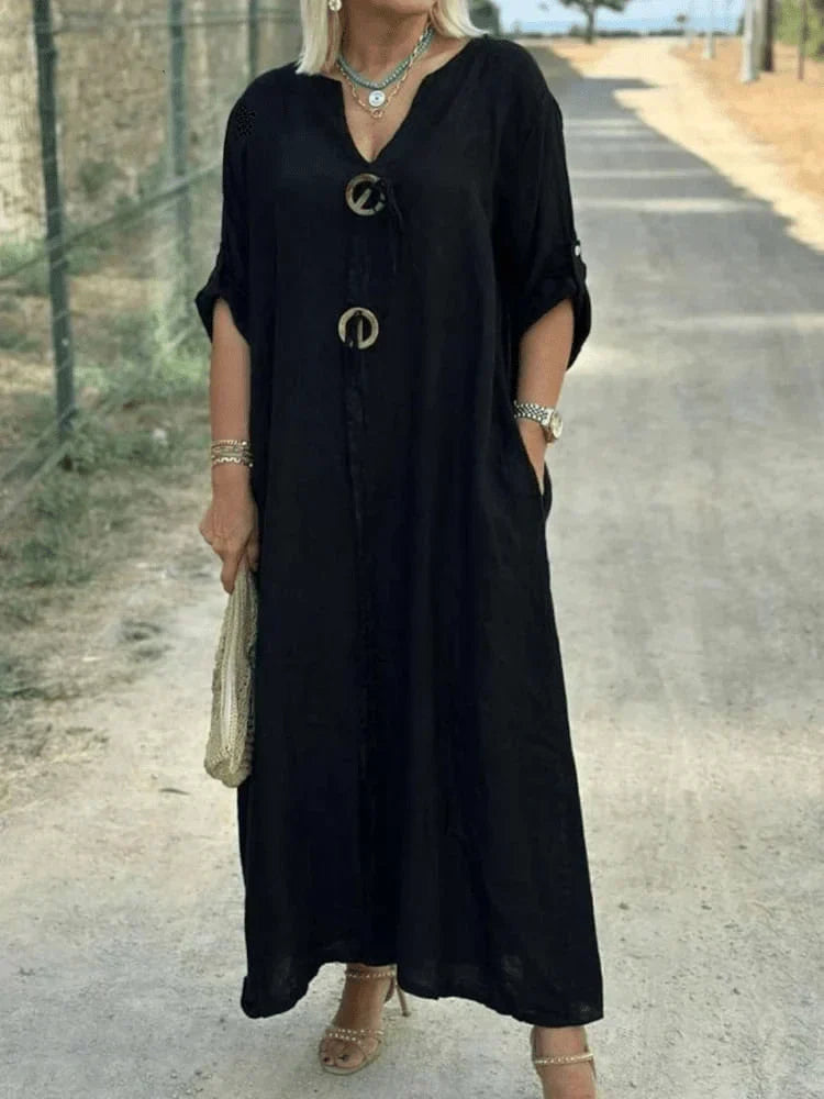 Versatile women's casual tunic dress, featuring a relaxed fit & adjustable sleeves for ultimate comfort.